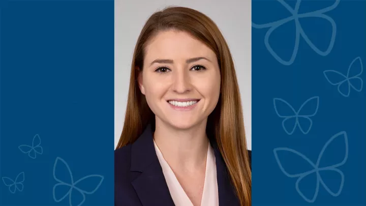 Professional headshot of Olivia Keane, MD against blue letterbox background